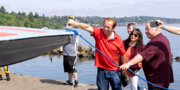 Stephen Hayden christening the restored Harrah’s Tahoe Miss in 2023 (Photo: H1 Unlimited)