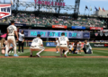 New dad Gilbert twirls Father's Day gem -- and brings baby to the podium (Photo: MLB.com)
