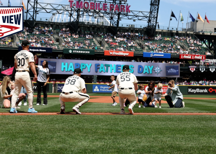 New dad Gilbert twirls Father's Day gem -- and brings baby to the podium (Photo: MLB.com)